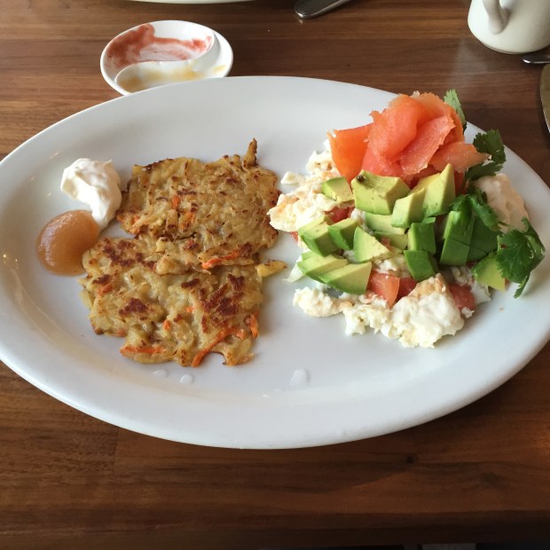The New Yorker (salmon and avocado scramble) with carrot potato latkes 