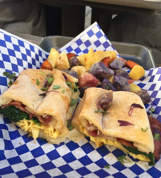 Millionaire’s Melt (egg sandwich with bacon and gouda aioli) 